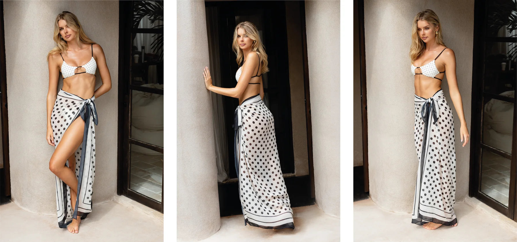 Long sarong with a light silhouette, printed with black polka dots on a white background with a fluid texture.
